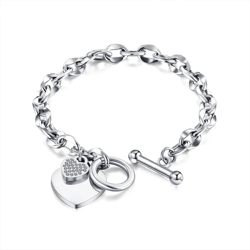 Hollow Heart Charm Bracelet for Women – Pearl & Fireball Accents.