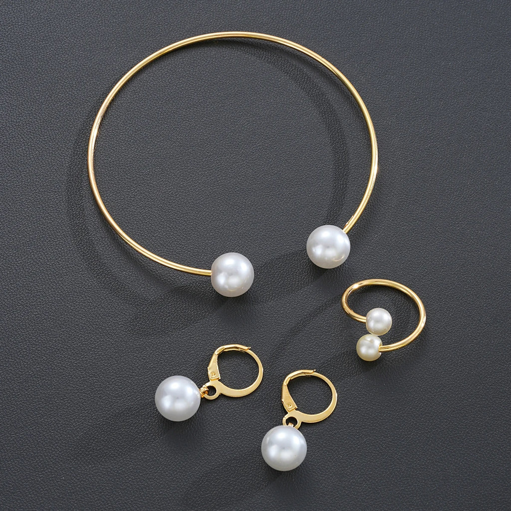 4-piece women’s pearl jewelry set. Gold-tone vintage style for special occasions