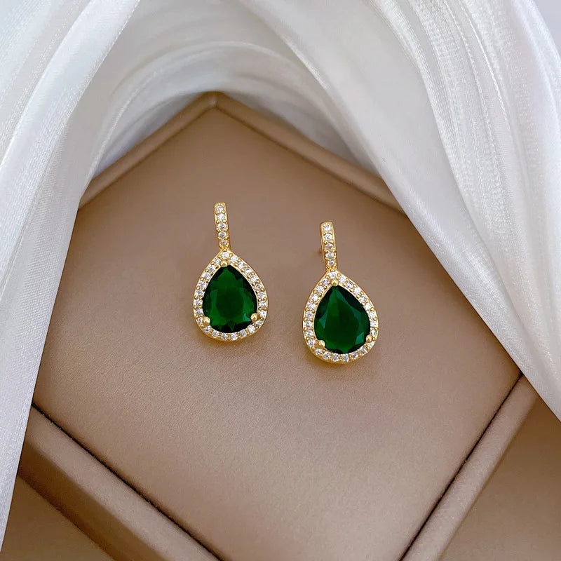 DIEYURO 316L stainless steel jewelry set with green water-drop zircon. Trendy and elegant