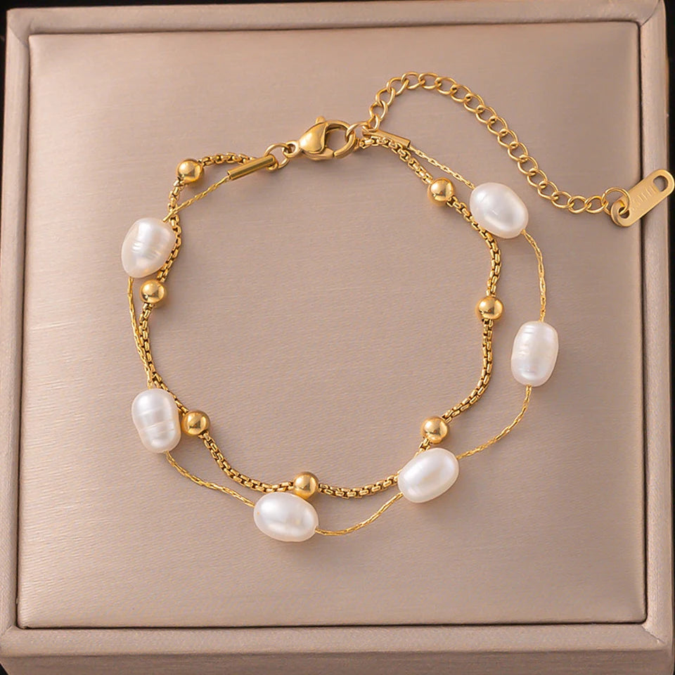 Yupsk double-layer stainless steel pearl bracelet. Gold-tone, elegant daily wear