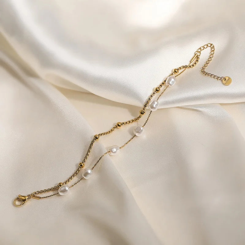 Yupsk double-layer stainless steel pearl bracelet. Gold-tone, elegant daily wear