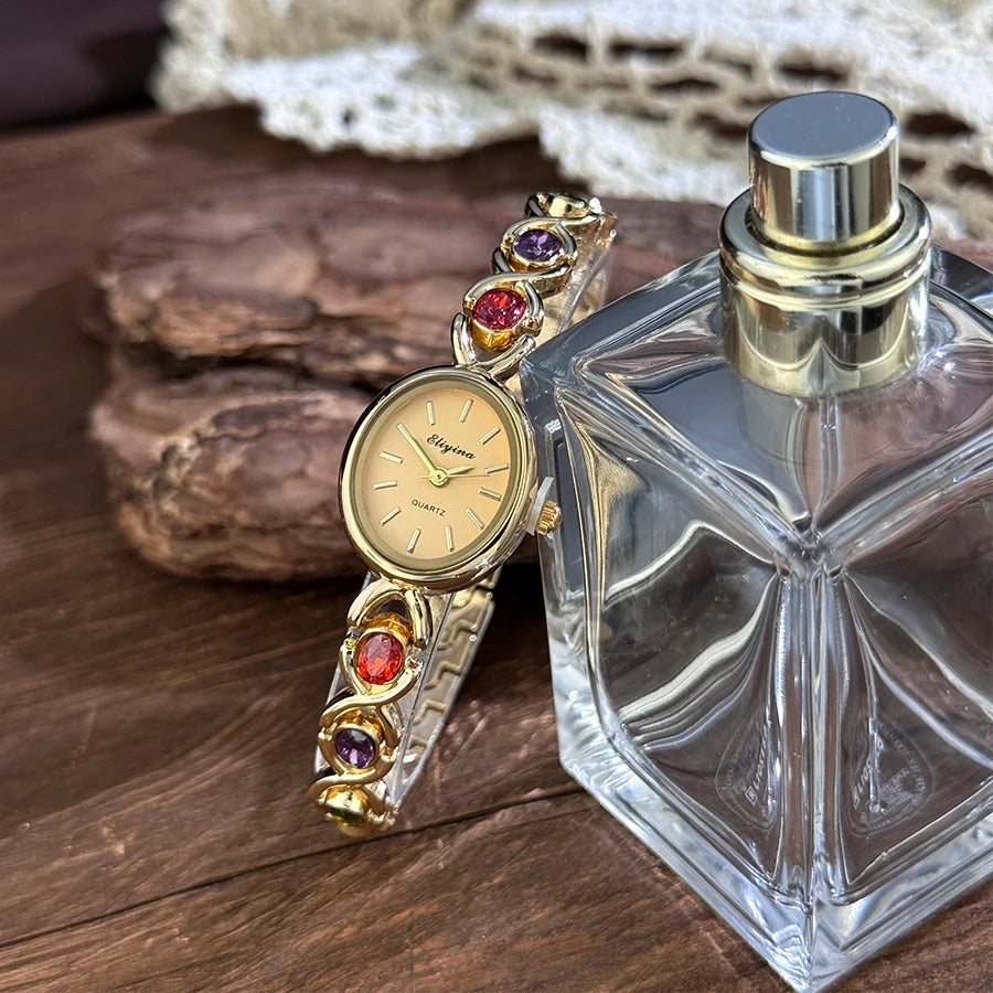 Retro round rainbow quartz watch for women. French-inspired luxury style