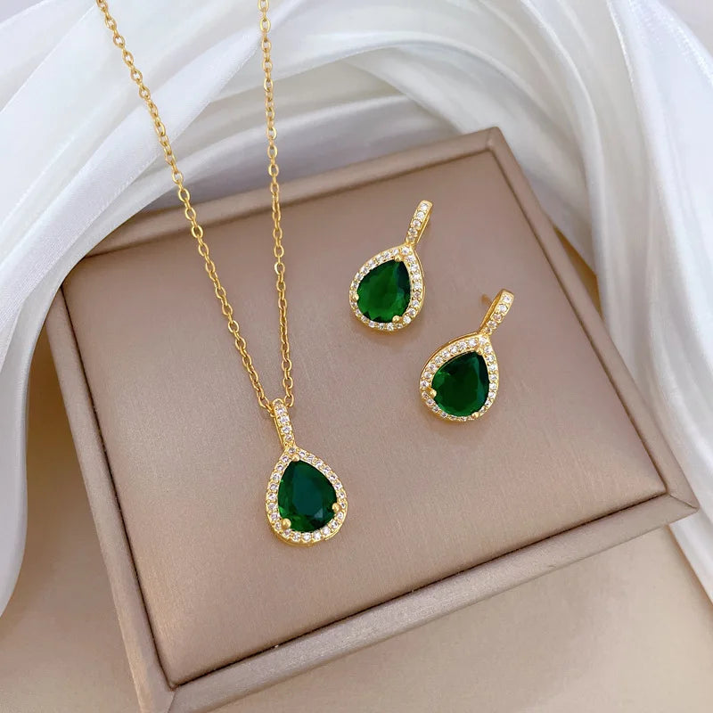 DIEYURO 316L stainless steel jewelry set with green water-drop zircon. Trendy and elegant